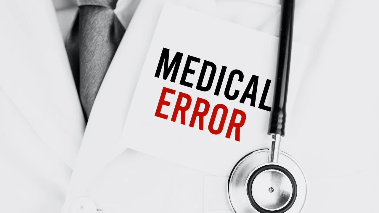 blue bowl of black bean beef tortilla soup on a board with cilantro and shredded cheese in background